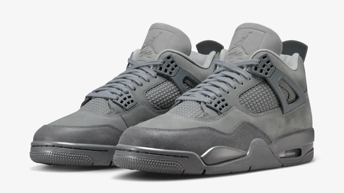 Image of a pair of stylish gray sneakers, featuring a sleek design with intricate detailing and lace-up closure, highlighted in an article categorized as Sneakers