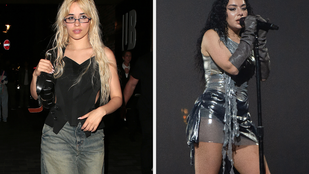Camila Cabello wears a black top and jeans, while Charli XCX performs in a metallic outfit with gloves, holding a microphone
