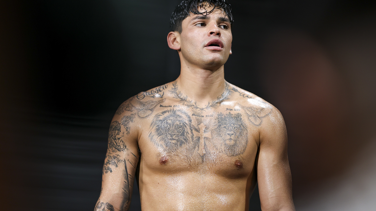 Boxer Ryan Garcia stands shirtless, showing his upper body tattoos, during a media workout at World Class Boxing Gym on April 09, 2024 in Dallas, Texas.