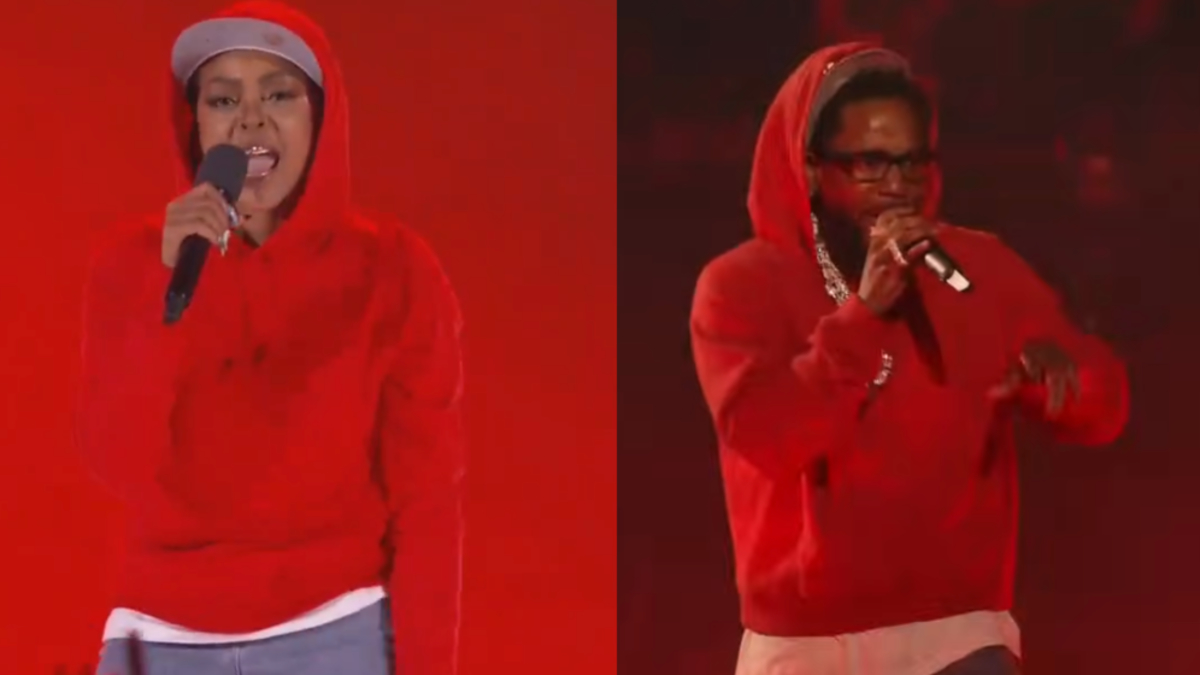 I don't know who these people are. Two individuals in red hoodies and caps performing on stage, each holding microphones