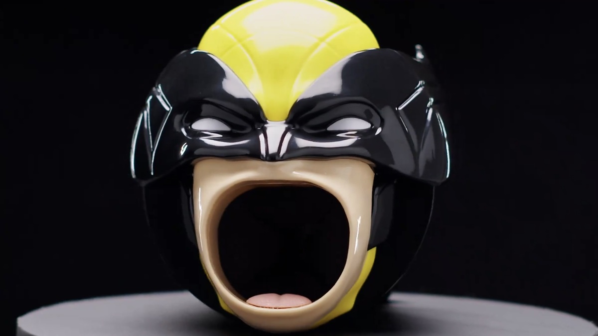 Ceramic cup shaped like Wolverine's head, with a large open mouth