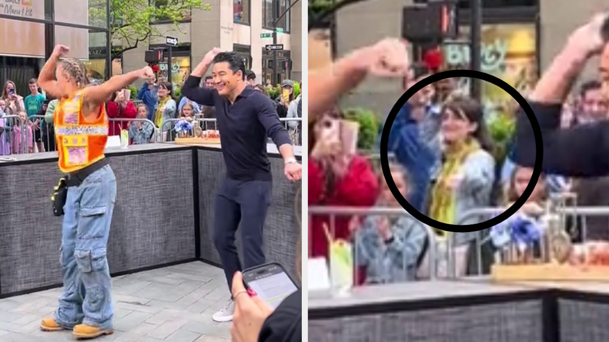 Mario Lopez and Ally Love dancing on an outdoor stage, audience member Sarah Haines circled in the background, smiling and clapping