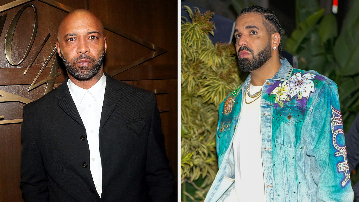 Joe Budden in a black suit jacket on the left, and Drake in a denim jacket with floral details and layered chains on the right