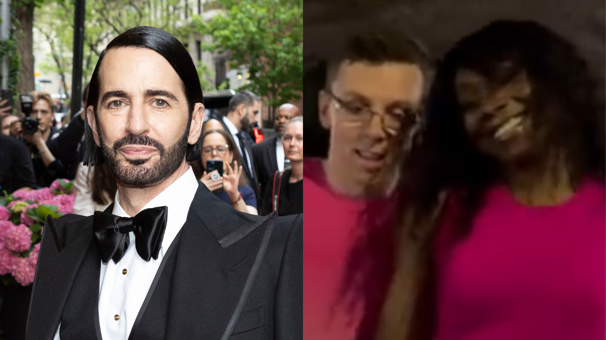 Marc Jacobs in a tuxedo at an event. Image also shows two unidentified individuals in pink shirts, smiling at the camera