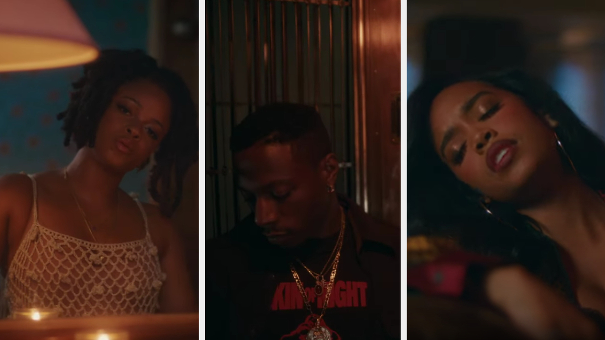 Three artists in a music video: a woman in a white top, a man with a necklace, and another woman resting her head