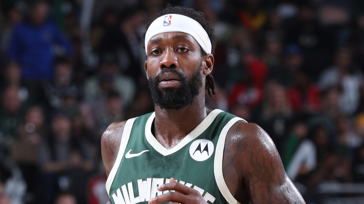 Basketball player in Milwaukee Bucks jersey focused during a game