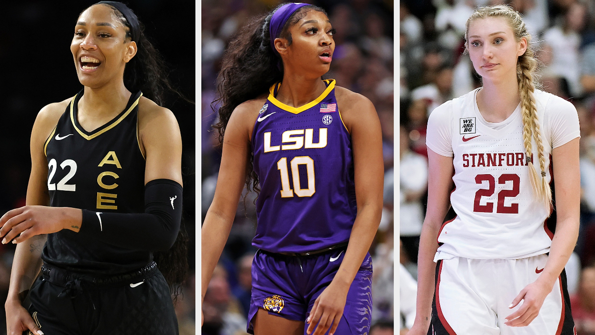 Three female basketball players in their team uniforms, mid-action on the court