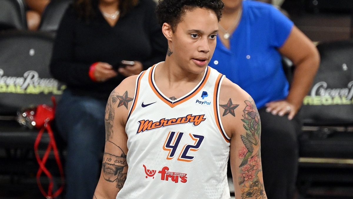 Brittney Griner in a basketball uniform, on the court during a game