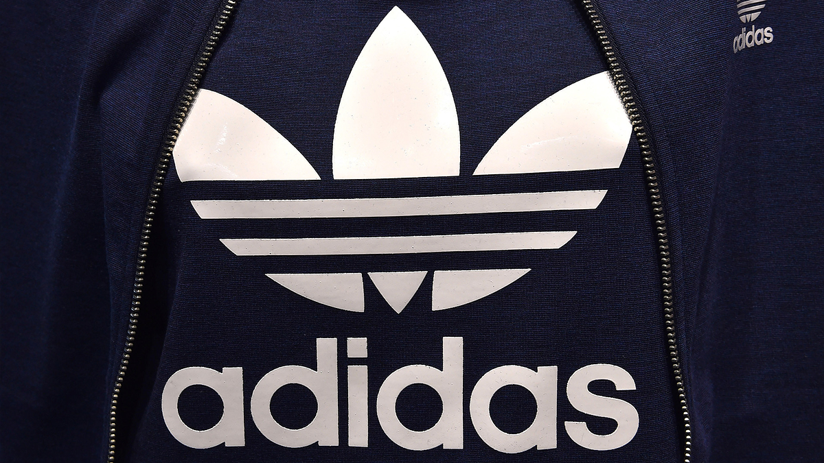 Close-up of an Adidas logo on apparel, related to an article on sneakers
