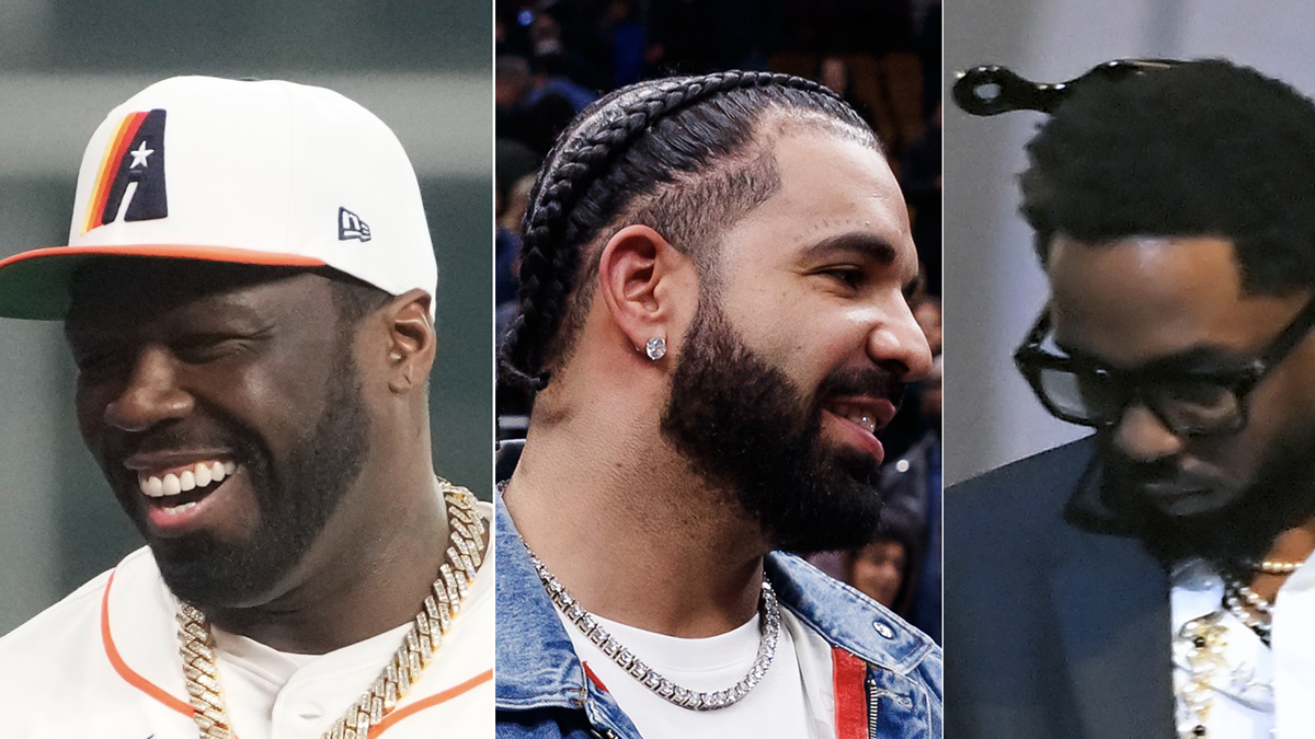 Three male artists smiling, middle with braided hair, all in casual attire