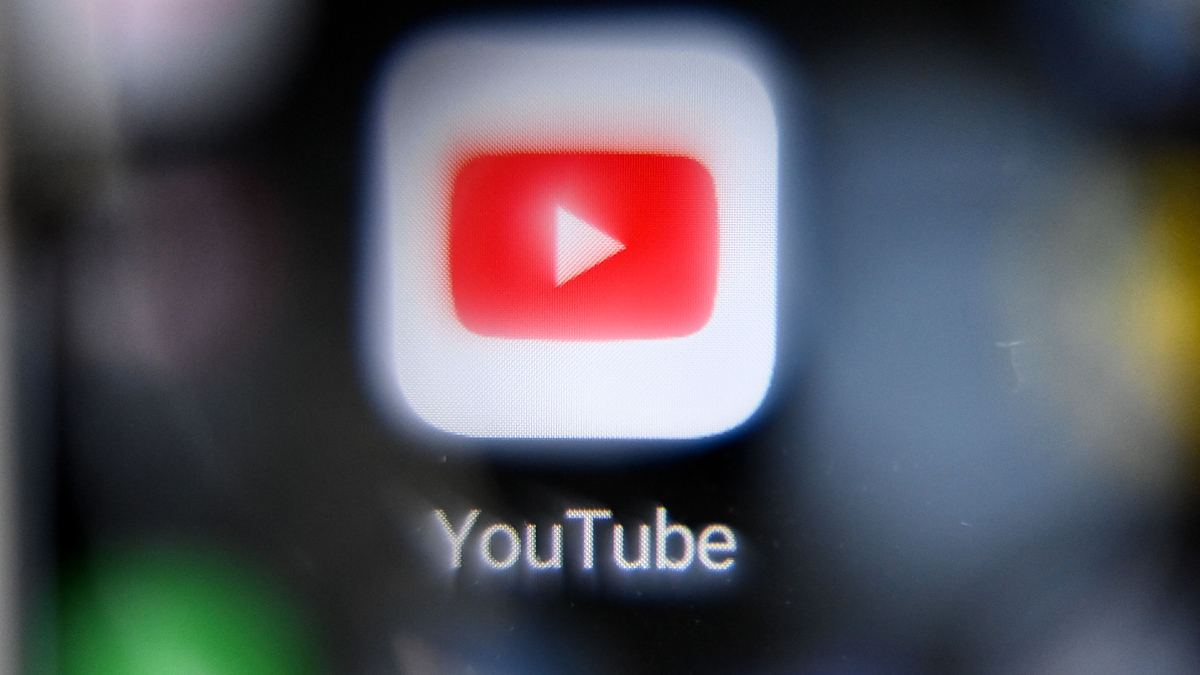 Close-up of a YouTube app icon on a screen
