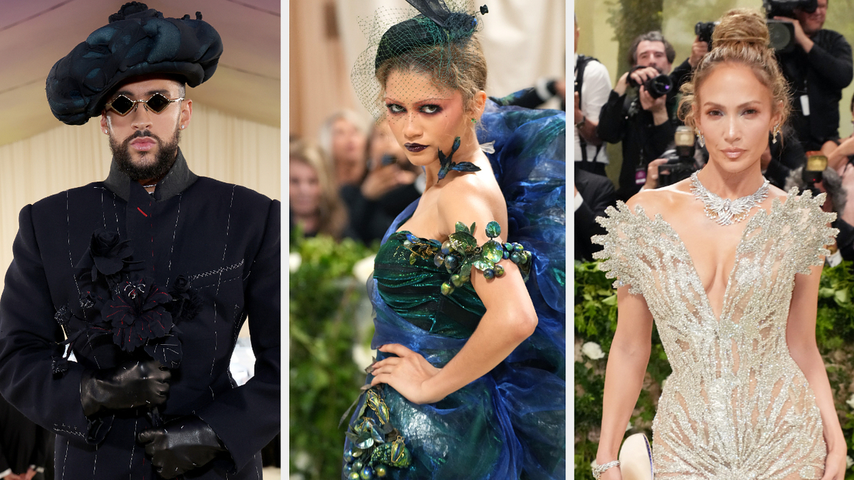 Three celebrities in elaborate outfits at a fashion event; ornate headpieces and detailed gowns visible