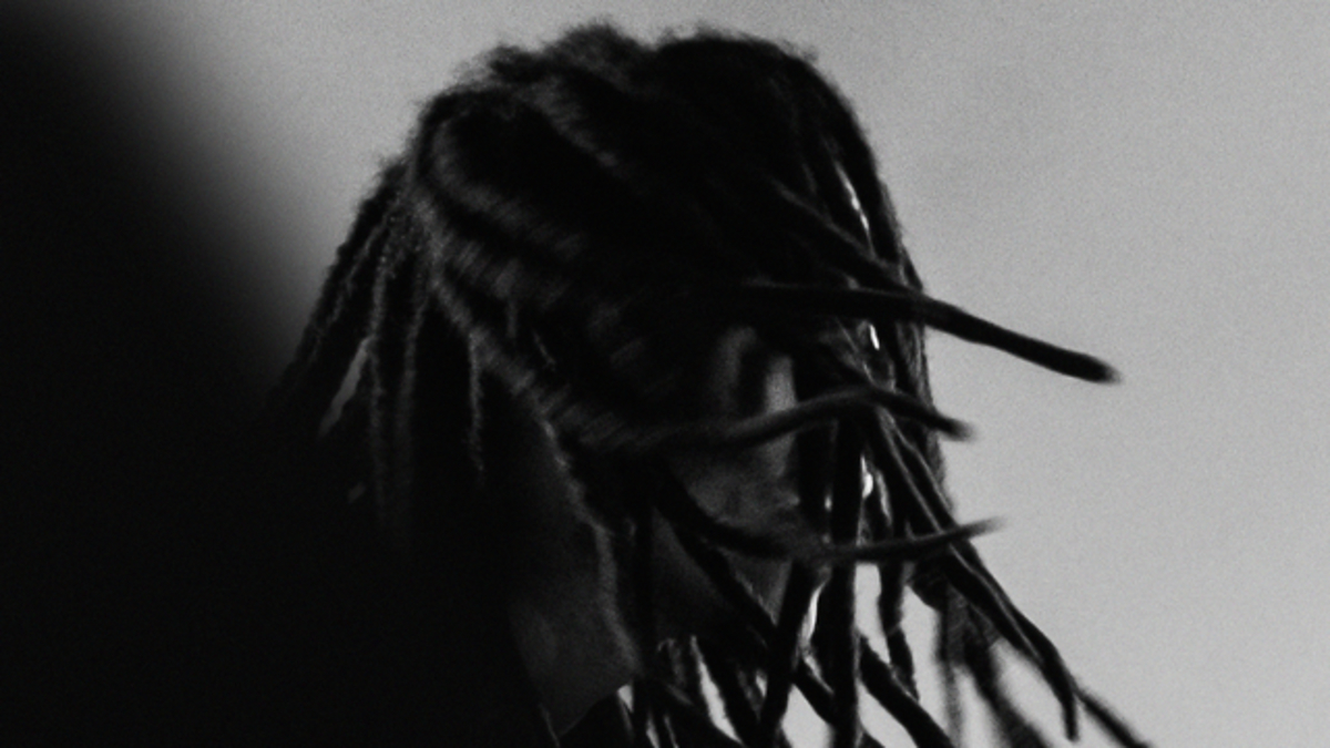 Silhouetted profile of person with dreadlocks against a dark background, text promoting "head.rap 024" featuring artists