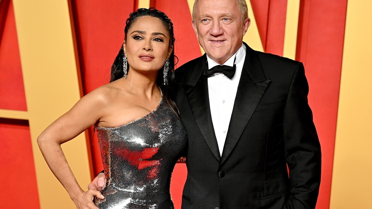 Salma Hayek in a sequined gown and François-Henri Pinault in a tuxedo pose together