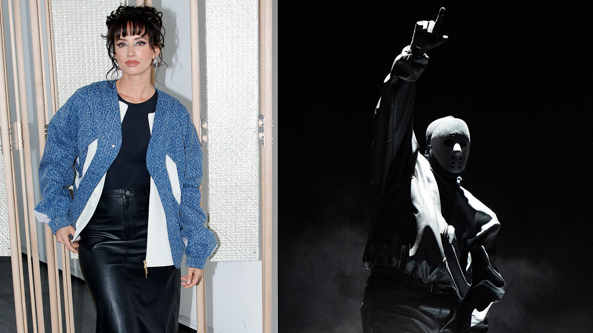 Julz in a denim jacket and jeans, and Ye on stage with one arm raised
