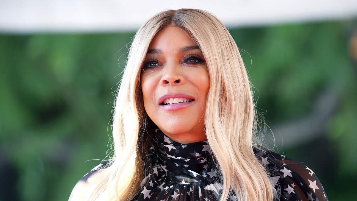 Wendy Williams wearing a star-patterned dress at a public event