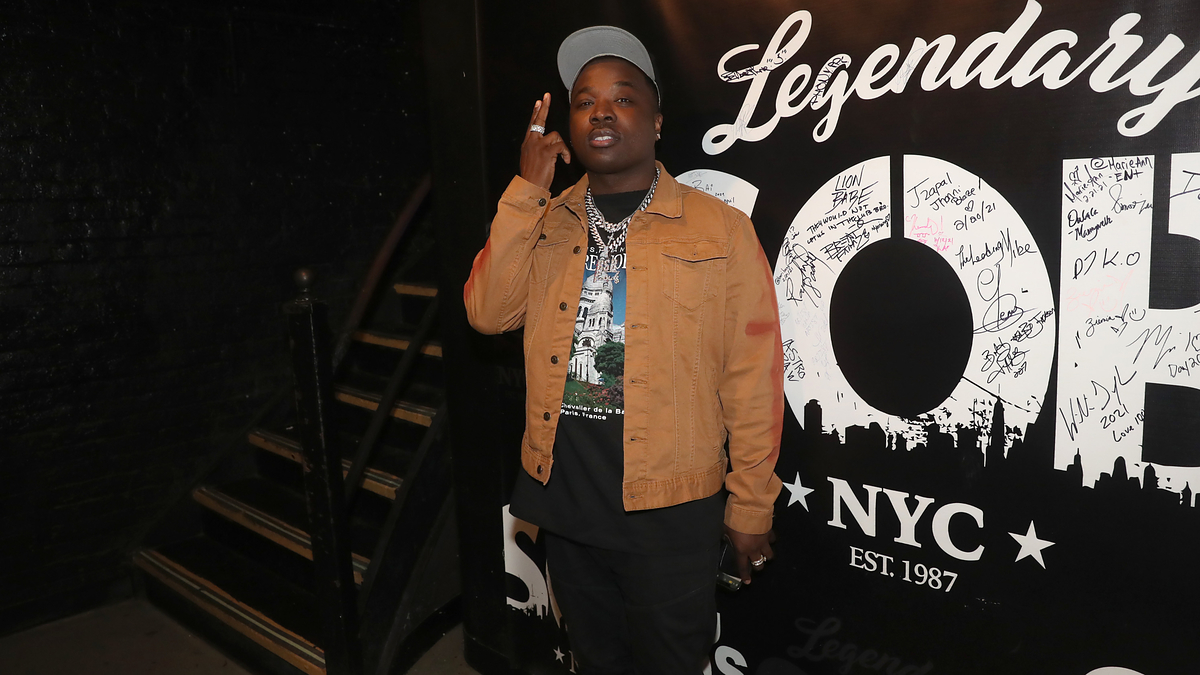 troy ave is pictured at an event