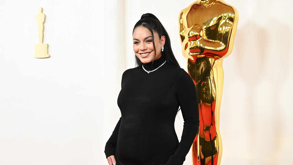 Vanessa Hudgens in a sleek black outfit at an awards event