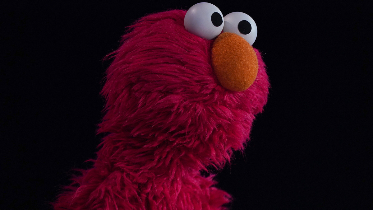 elmo is seen giving a speech