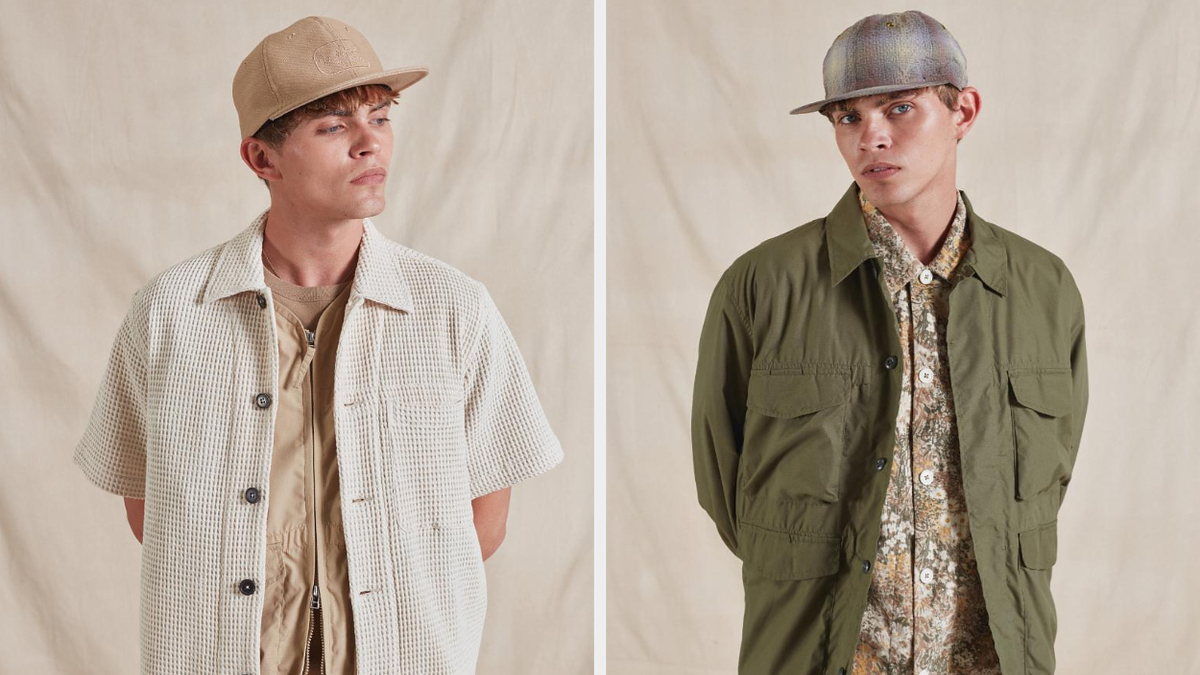 Two models showcase casual spring looks with layered shirts and hats