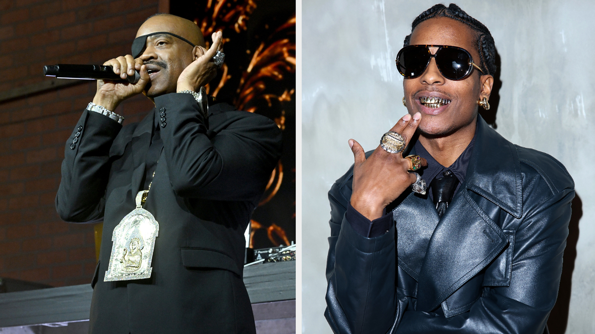 Two male artists, one performing with a microphone, the other wearing sunglasses and jewelry