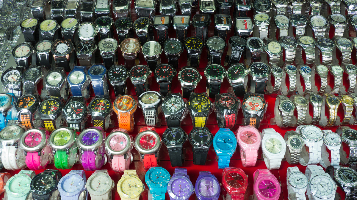 a bunch of fake watches are pictured