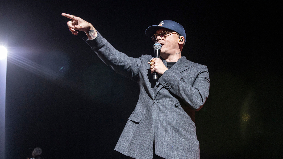 logic wearing suit