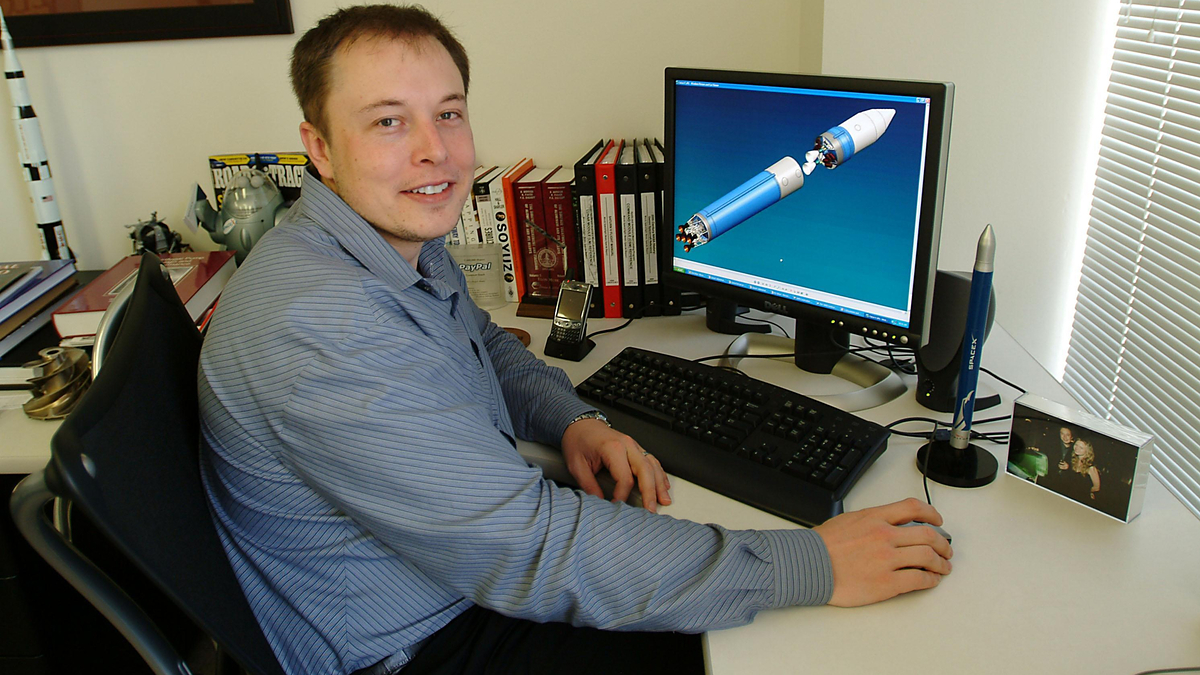 elon musk at desk