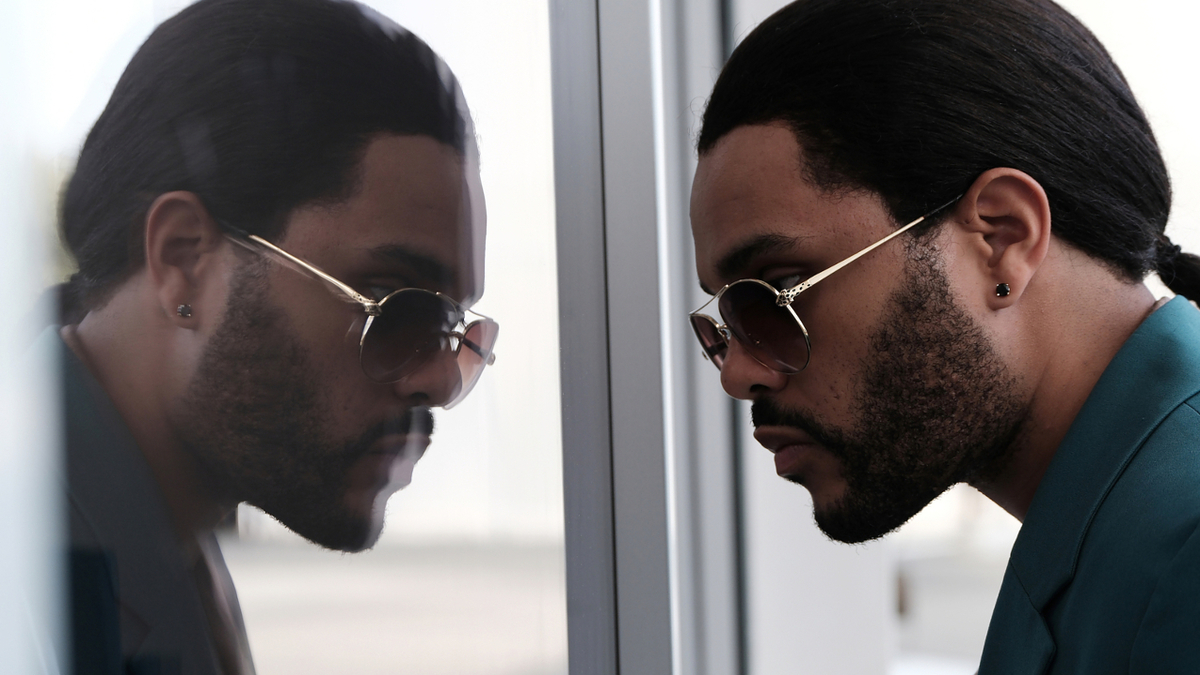 the weeknd in a reflection