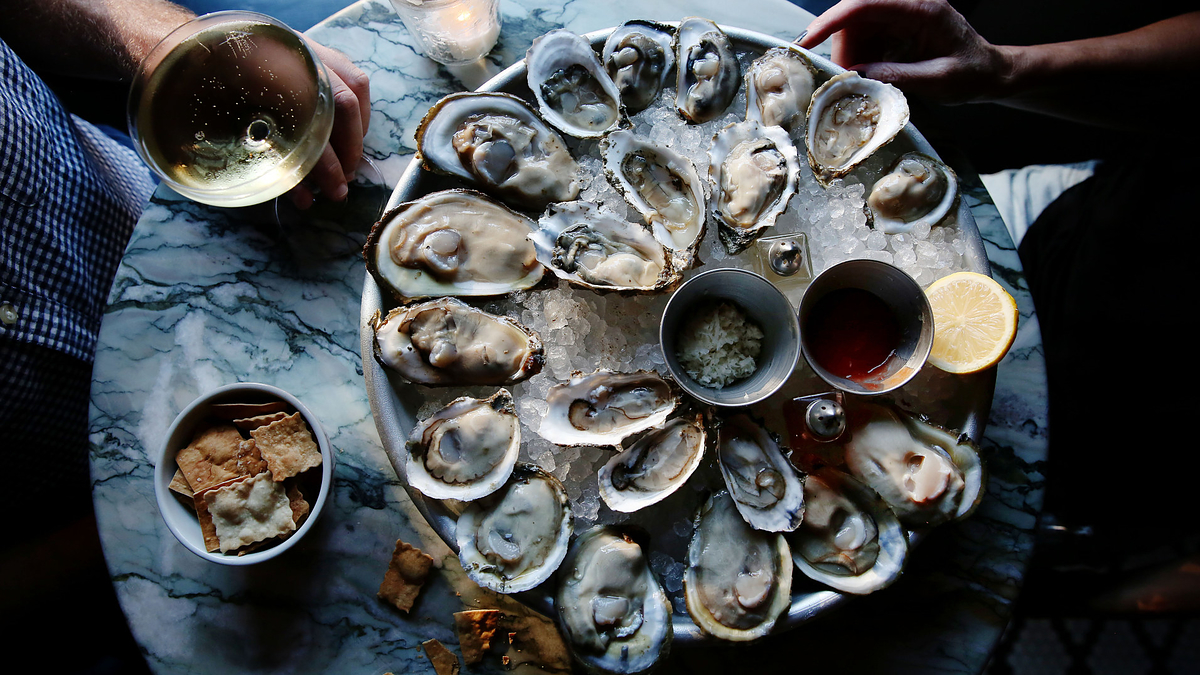raw oysters at table