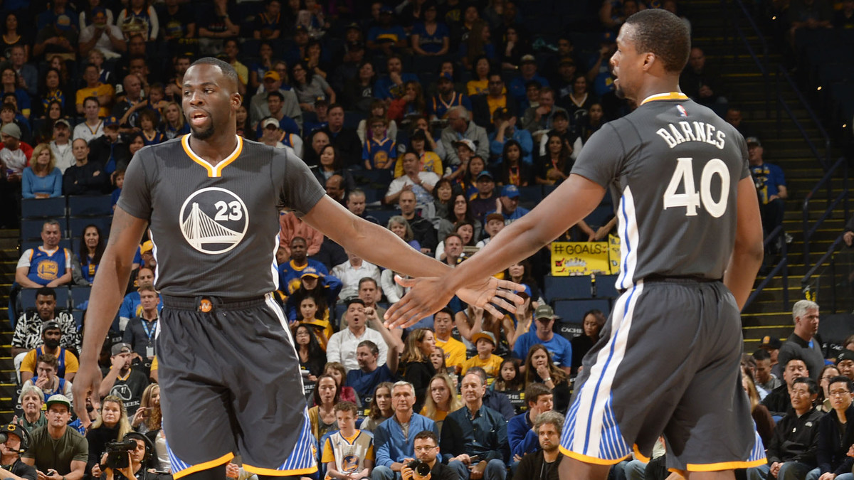 Golden State Warriors forwards Draymond Green and Harrison Barnes in 2016