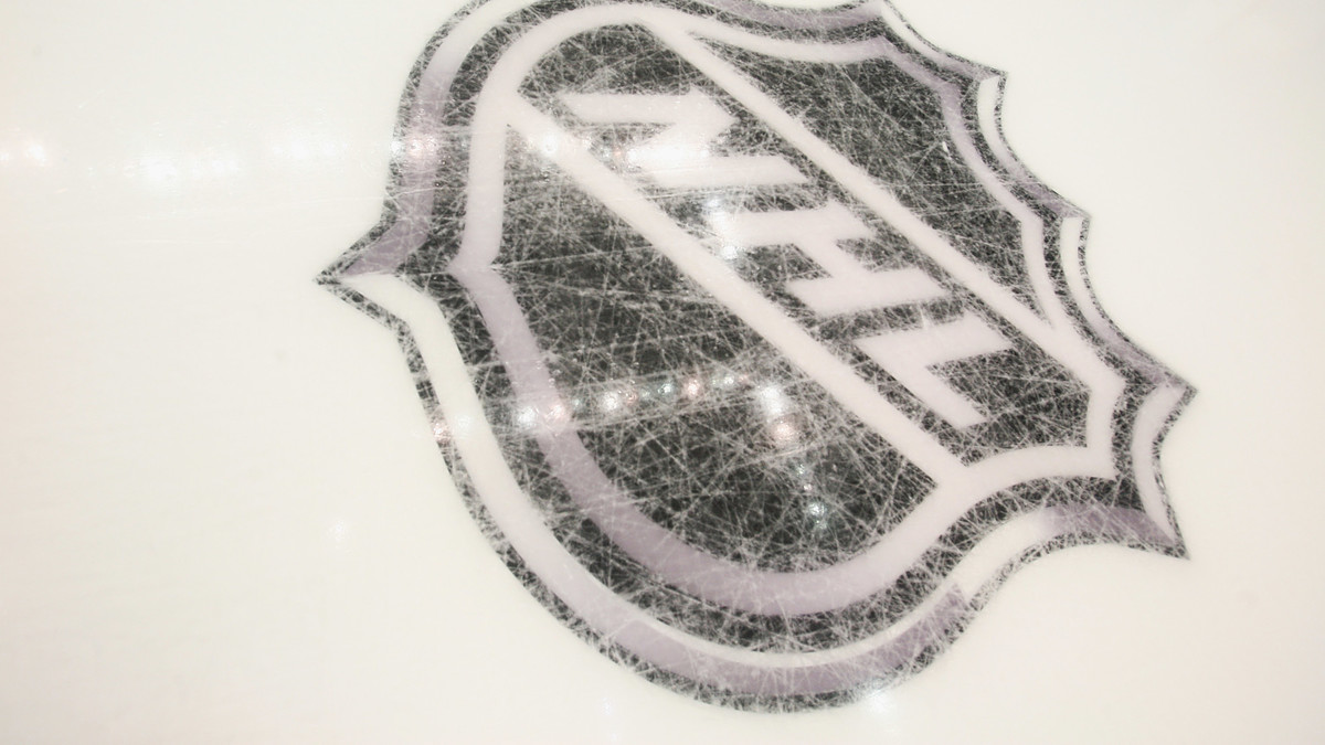 national hockey league logo on the ice