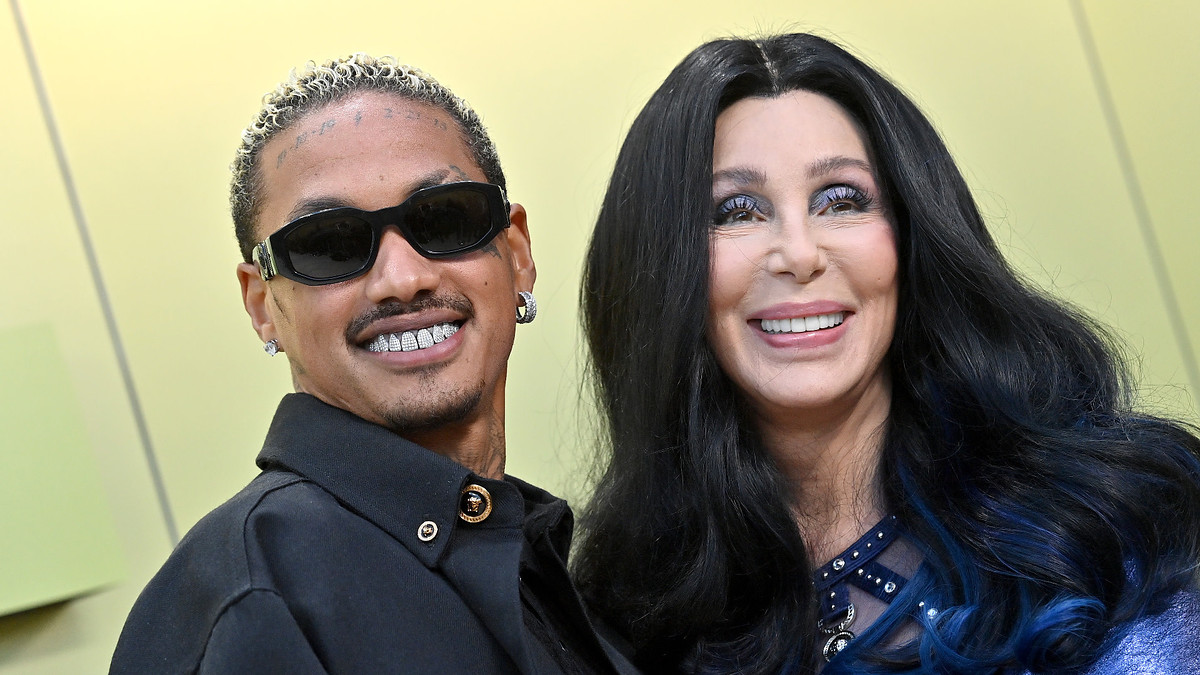 Alexander Edwards and Cher photographed together.