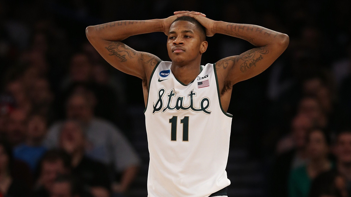 Keith Appling reacts during the 2014 NCAA Men's Basketball Tournament.