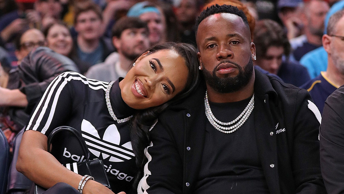 Yo Gotti and Angela Simmons appear at Memphis Grizzlies game