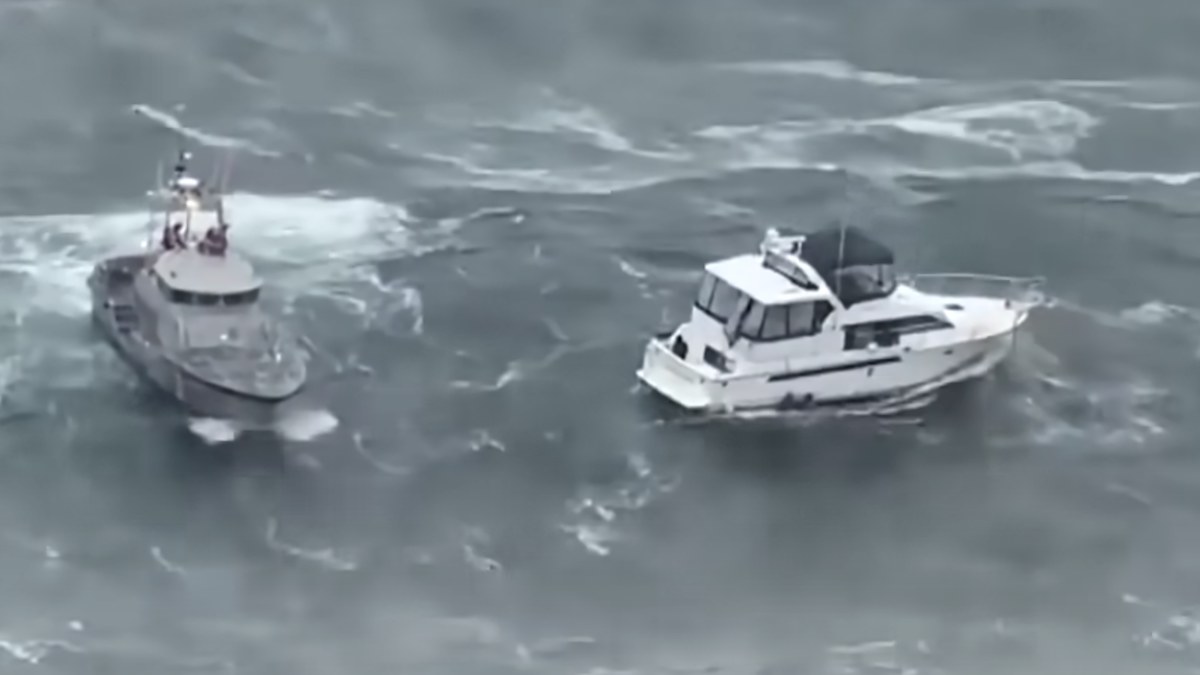 Coast Guard video from the rescue shows the vessel, at right, in distress.