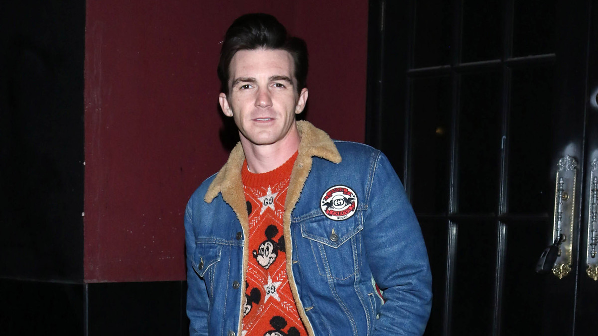 Drake Bell is seen in denim jacket