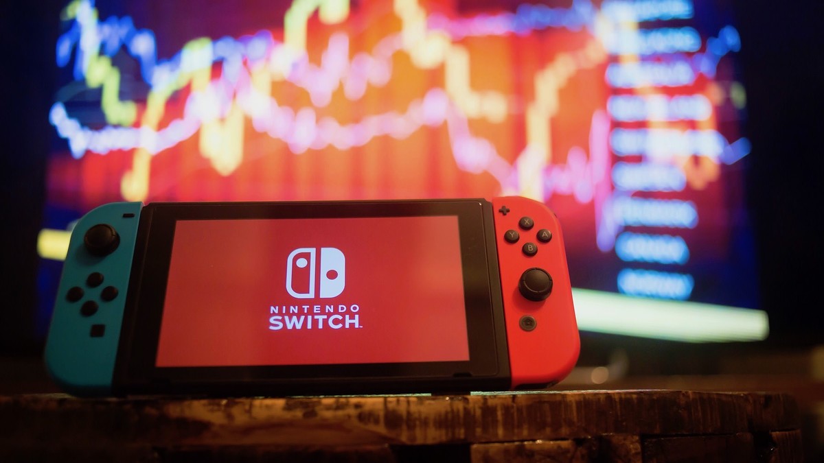 In this photo illustration, a Nintendo Switch displays the Nintendo Switch logo