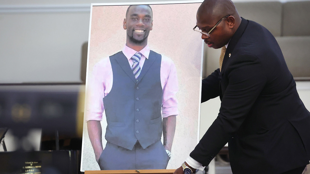 A photo of Tyre Nichols is positioned prior to a press conference