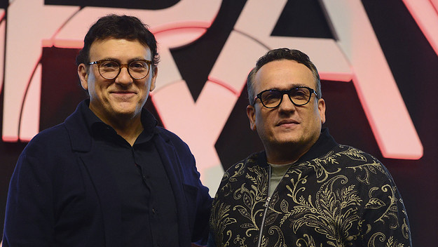Joseph and Anthony Russo pose for pictures during 'The Gray Man' press conference.