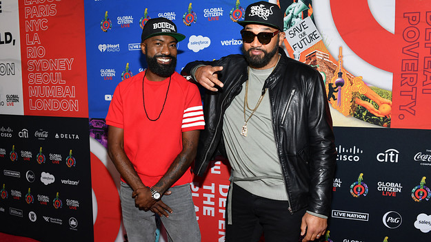 Desus and Mero are seen on a red carpet