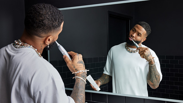Free agent Odell Beckham using his MOON toothbrush.