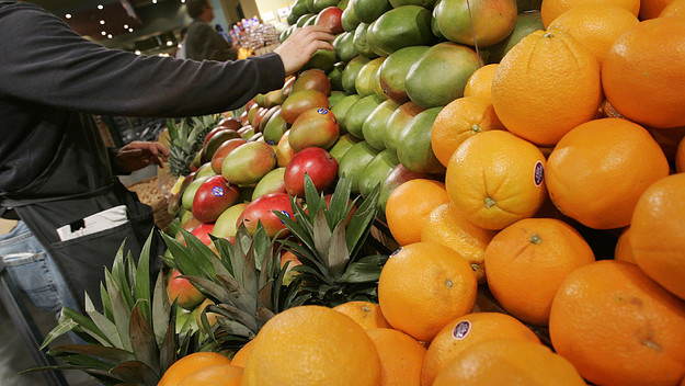 Person shopping the fruit aisle
