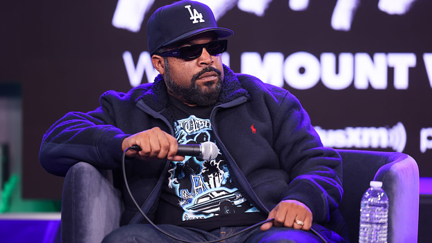Ice Cube is seen holding a mic
