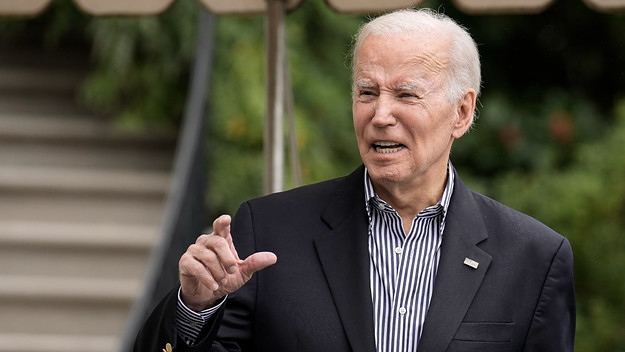Joe Biden talks to reporters on the South Lawn of the White House.
