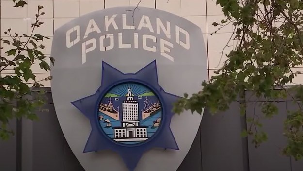A logo for Oakland police is pictured