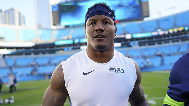Chris Carson #32 of the Seattle Seahawks after their game against the Carolina Panthers