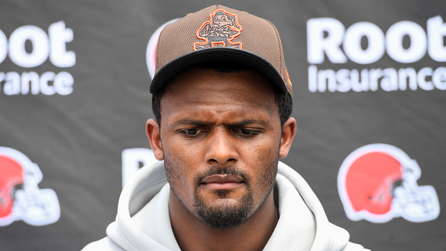Deshaun Watson listens to questions during a press conference.