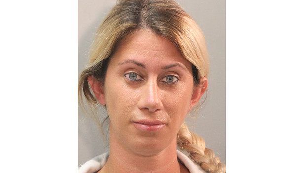 A womans mugshot is pictured in a news release from police