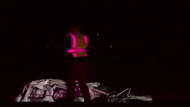 A destroyed patrol car is pictured after a train strike